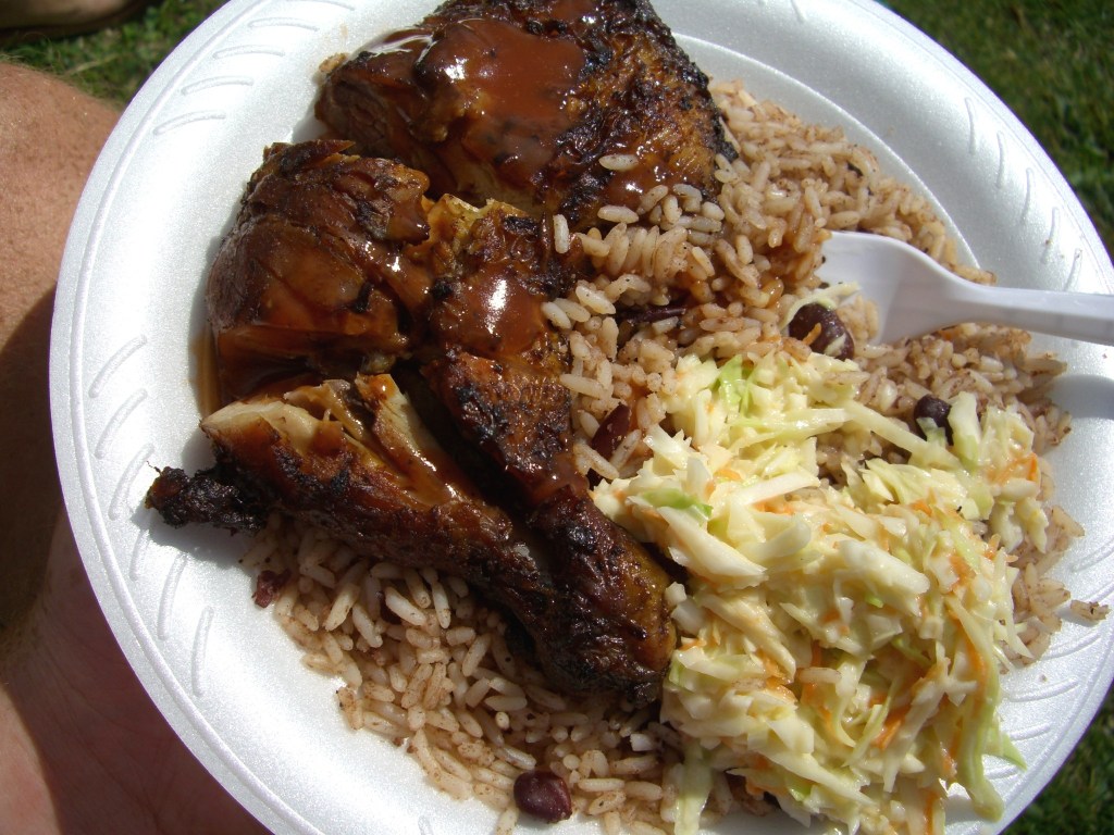 Jerk chicken with rice and peas and coleslaw